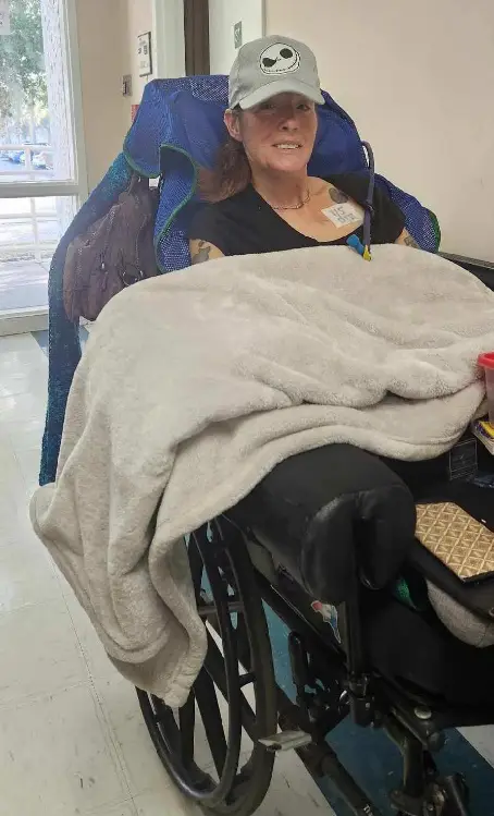 Jean in her recliner manual wheelchair